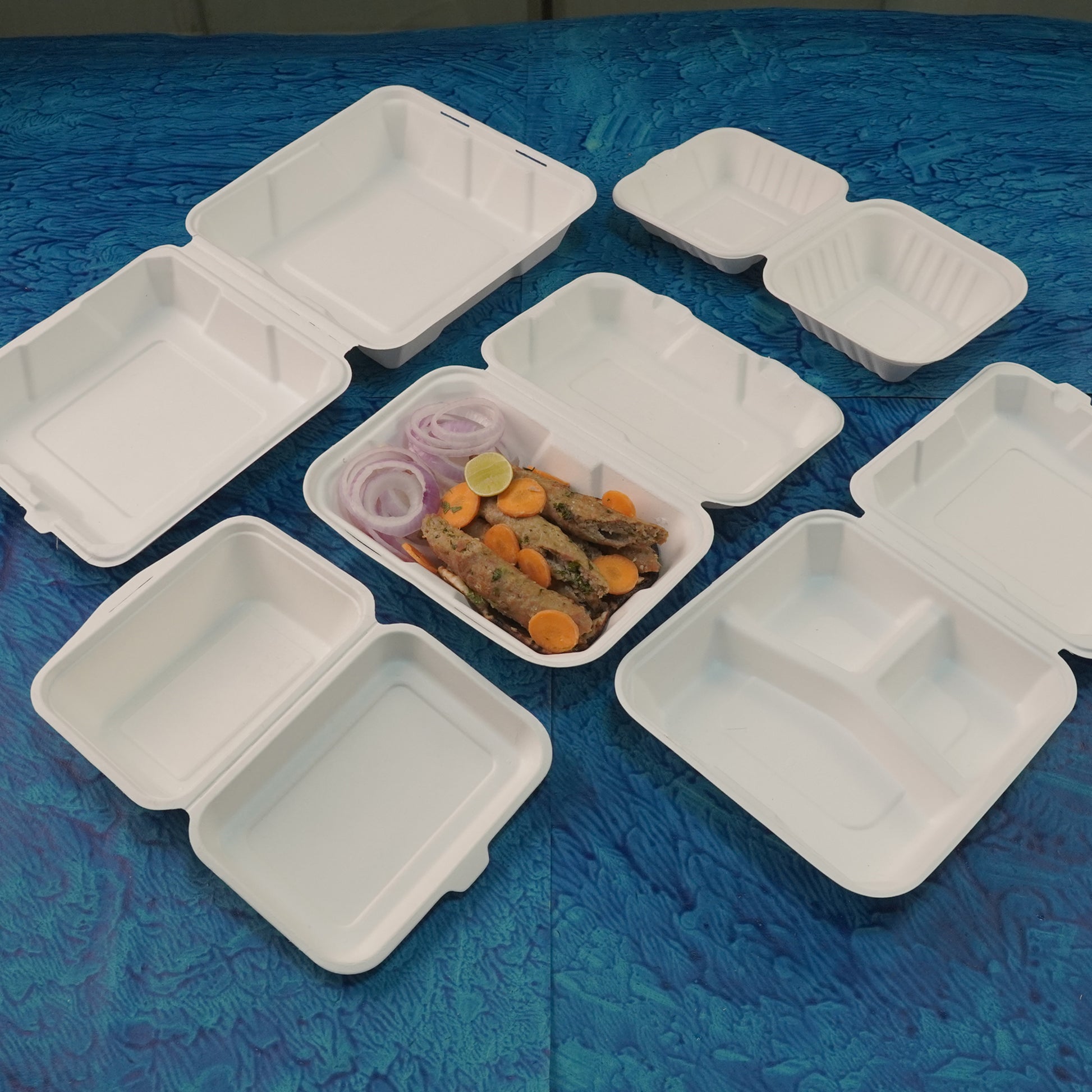 Eco-friendly disposable tableware sample kit with plates, cups, and cutlery